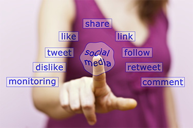 hand touching social media button